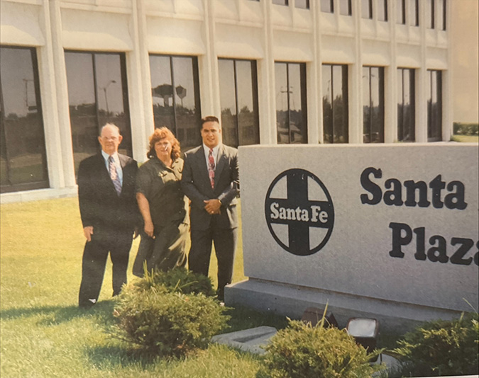 George Wong, right, pictured with his grandfather and grandmother on his first day of work at Santa Fe Plaza in Topeka, Kansas. George Wong, right, pictured with his grandfather and grandmother on his first day of work at Santa Fe Plaza in Topeka, Kansas.