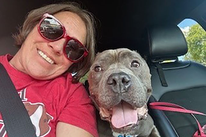 Nelson and foster dog Benedict out for a ride